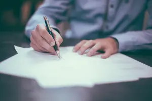a person signing an insurance policy
