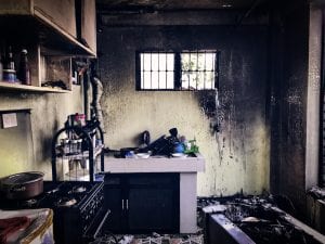 kitchen walls covered in soot after a winter fire