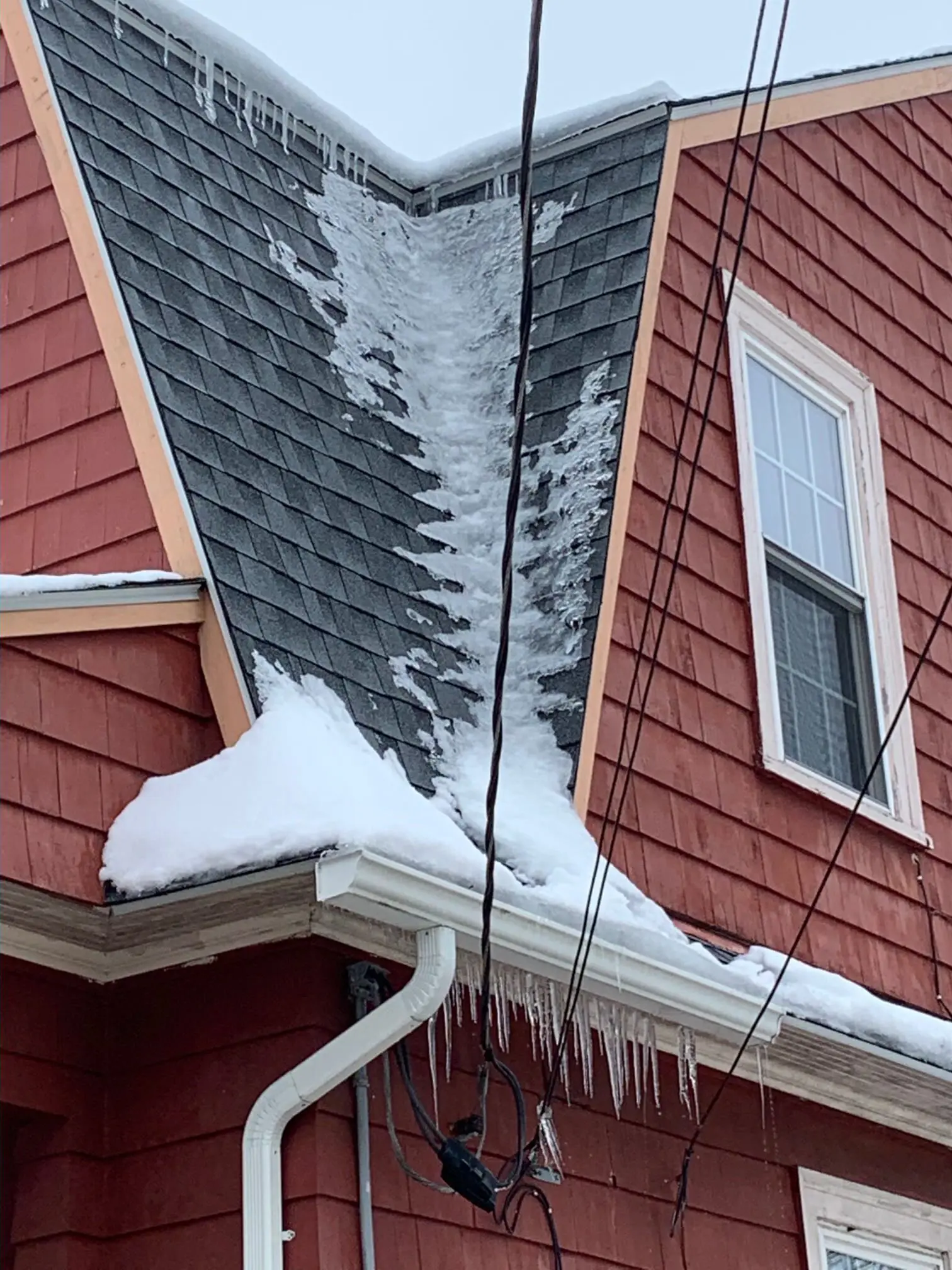 ice dam roof damage ri